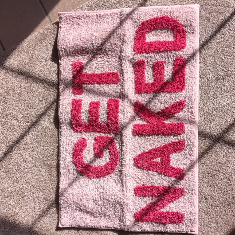 GET NAKED Bath Rug